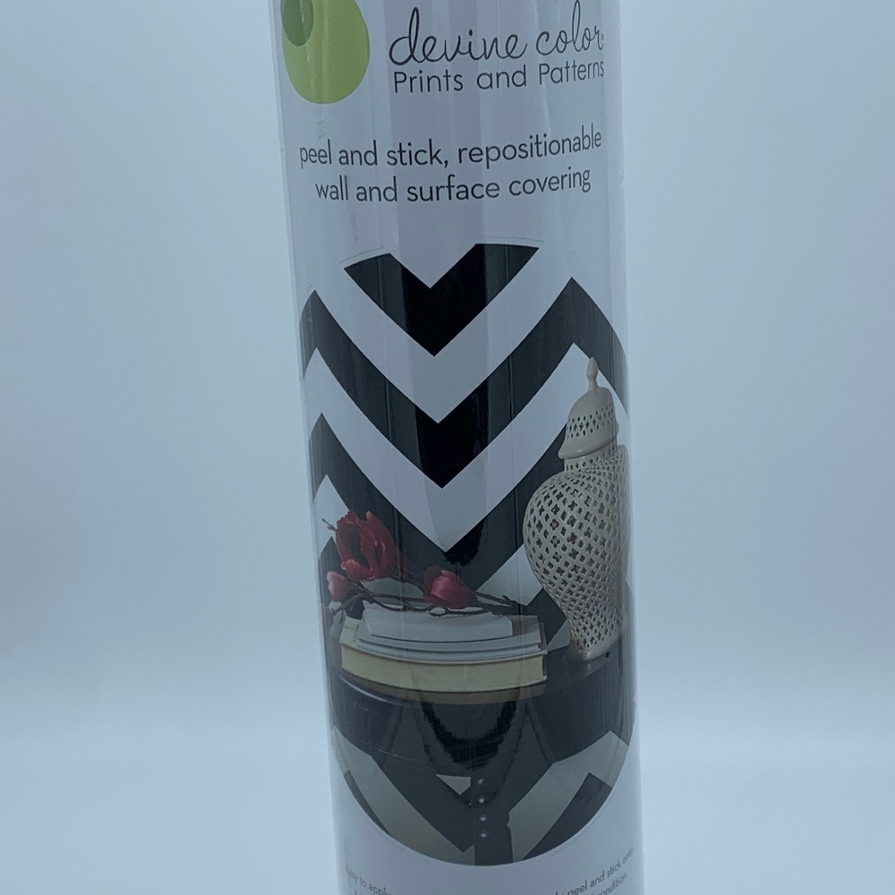 DEVINE COLOR PRINTS & PATTERN PEEL AND STICK SURFACE COVERING.